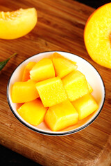 Fresh Yellow Nectarine Slices in Bowl on Wooden Board - Healthy Fruit Snack