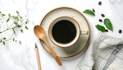 Rustic ceramic cup of black coffee with wooden spoon on marble background