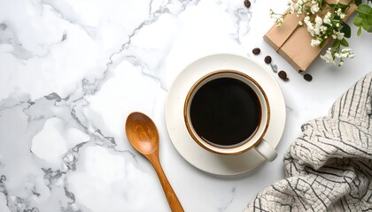 Rustic ceramic cup of black coffee with wooden spoon on marble background