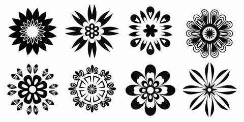 Collection of eight stylized black floral ornaments and decorative elements on a white background