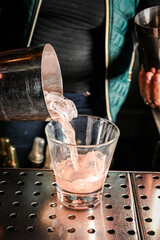 Bartender Pouring Drink from Shaker