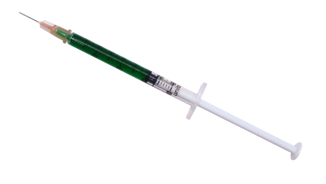 1 ml syringe filled with green solution isolated on white background