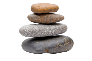 Stack of smooth stones arranged in a balanced configuration isolated on a clean white background showcasing natural texture and color variation