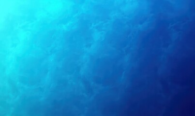 Obraz premium Underwater scene with clear blue water showing gradient from light to deep blue with soft currents and calm texture
