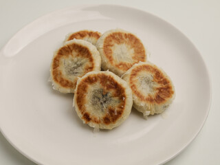 Bakpia is an Indonesia's traditional snack made from baked pastry and filled mung bean paste. Isolated on white 
