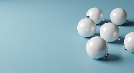 Spherical orbs arranged against a soft, uniform pastel backdrop, evoke a sense of minimalism and elegance.