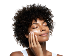 Radiant woman applies facial cream for skincare routine promoting healthy hydrated skin and a rejuvenating experience using a beauty product for anti-aging treatment on her