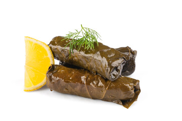 Delicious Turkish dish, stuffed vine leaves, on a white background