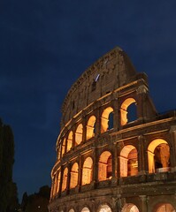 Colosseum at night in Rome, Italy. The Colosseum is one of the main tourist attractions in Rome.