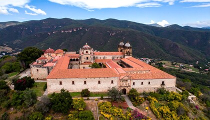 Majestic Monastery Perched on a Hilltop Amidst Lush Greenery.