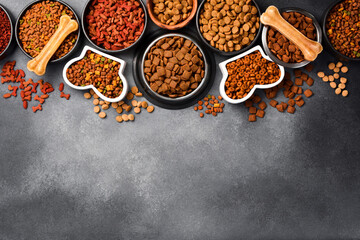 A large selection of food for pets. Top view. A type of nutritious food.