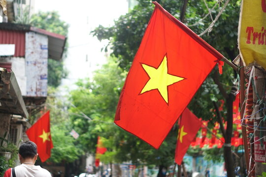 Hanging Vietnamese national flag displayed to celebrate the 80th anniversary of Vietnam National Day, September 2, 2025, marking the historic milestone with the A80 military parade in Hanoi. 