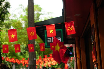 Hanging Vietnamese national flag displayed to celebrate the 80th anniversary of Vietnam National Day, September 2, 2025, marking the historic milestone with the A80 military parade in Hanoi. 