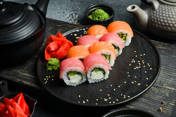 Sushi roll set with smoked fish and cream cheese (Philadelphia). Asian cuisine. Top view. Free space for your text.