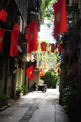 Hanging Vietnamese national flag displayed to celebrate the 80th anniversary of Vietnam National Day, September 2, 2025, marking the historic milestone with the A80 military parade in Hanoi. 