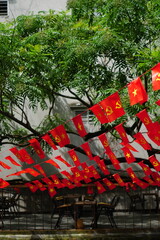 Hanging Vietnamese national flag displayed to celebrate the 80th anniversary of Vietnam National Day, September 2, 2025, marking the historic milestone with the A80 military parade in Hanoi. 
