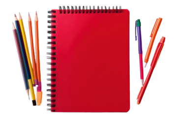 Back to school with a blank red notebook surrounded by colorful pencils and pens on a clean surface ready for study