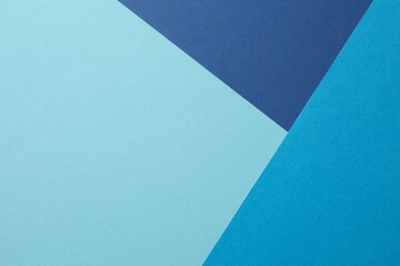 Abstract art, blue paper background. Abstract design of monochrome paper background