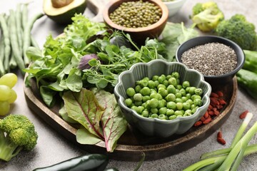 Superfood. Different healthy products on grey table, closeup