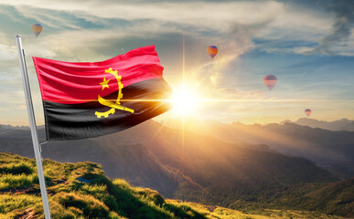 Angola flag waving in beautiful scenery. Angola national flag for independence day.