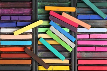 Set of colorful chalk pastels as background, closeup