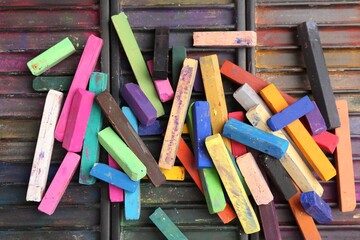 Set of colorful chalk pastels as background, closeup