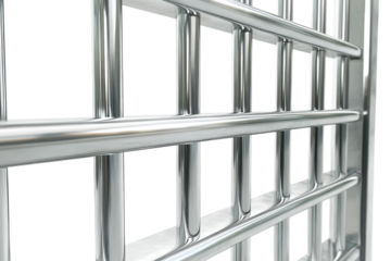Prison bars isolated on a white background showcasing their metallic structure and design in a minimalist setting for artistic interpretation and analysis