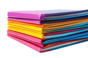 Colorful stack of binders arranged neatly on a white background displaying various vibrant hues