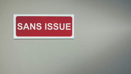 Red and white French sign with the text 