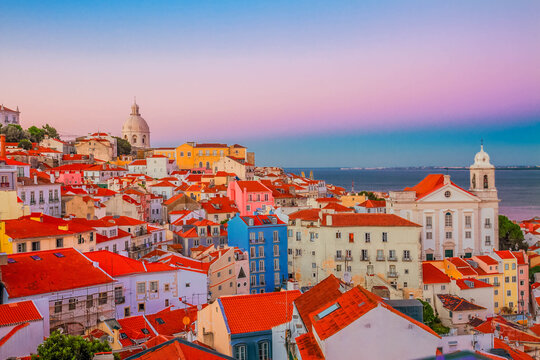 view of Alfama old town at sunset, Lisbon, Portugal - Powered by Adobe