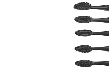 Five new black toothbrushes isolated on white