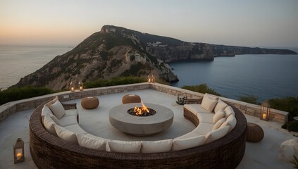 Luxury terrace on a rocky coast with sea view at sunset