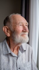 Obraz premium Elderly man looking out window with calm smile quiet reflection and peace 