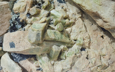 A mineral of complex composition. Geology and Mineralogy