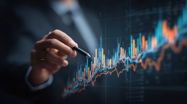 A close-up shot of a financial analyst uses a pen to trace rising stock market trends on a modern digital interface. This image conveys the essence of financial analysis, market monitoring.