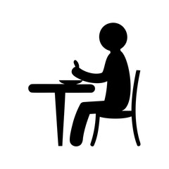Silhouette of person at table giving thumbs up after meal