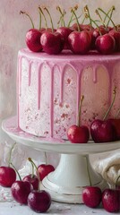 A cherry cake with pink frosting dripping down the sides