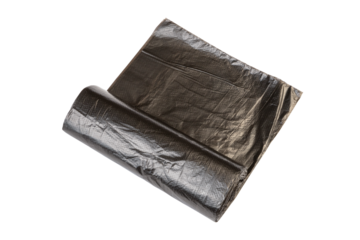 roll of black plastic garbage bags for waste collection and storage isolated on white background. New rolled plastic bin bags