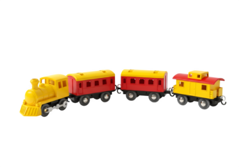 Colorful toy train with carriages isolated on transparent background in studio