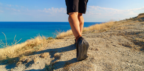 mens foot step on seaside
