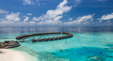 Amazing Maldives resort water villas aerial landscape sunny tropical island blue sea stunning...