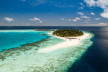 Obraz premium Amazing Maldives. Best aerial landscape with sunny tropical island sunshine blue sea and stunning scenic background perfect summer vacation luxury travel paradise destination top tourism escape