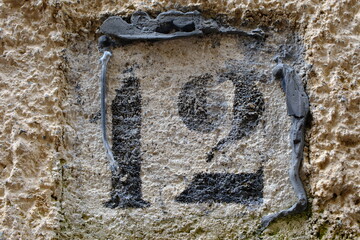 House number plate 12 close-up, Italy