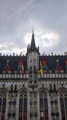 Fototapeta premium Vertical Travel Photography of Bruges, Belgium – Medieval Canals, Architecture and Landmarks