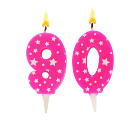 Burning pink with white stars birthday cake candles isolated on white background. Number 90.	