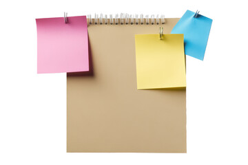 Sticky notes attached to an empty spiral notebook with a clean background showcasing vibrant colors and organization in a workspace
