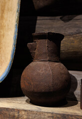 Antique cast iron jug with spout.
