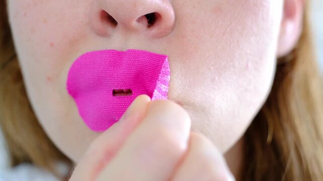 Individual applying an anti-snoring patch to mouth, demonstrating the gradual process of securing the patch, leading to a relaxed expression, promoting nasal breathing for improved sleep quality