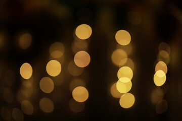 Abstract Warm Golden Bokeh Lights Background for Festive Celebrations and Cozy Ambiance