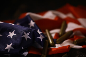 Naklejka premium American Flag with Bullet Casings: Symbolizing Patriotism and Gun Violence in the USA